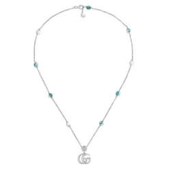 Colgante de plata Gucci GG Marmont con nácar, topacio azul y resina turquesa