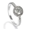 Solitario de oro blanco 0,39 quilates con orla de pavé de diamantes 0,59 quilates