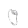 Solitario de oro blanco de 0,29 quilates engastado en 4 garras con orla de pavé de brillantes