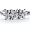 Sortija de oro blanco con 3 rosetas de diamantes en garra