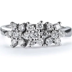Sortija de oro blanco con 3 rosetas de diamantes en garra