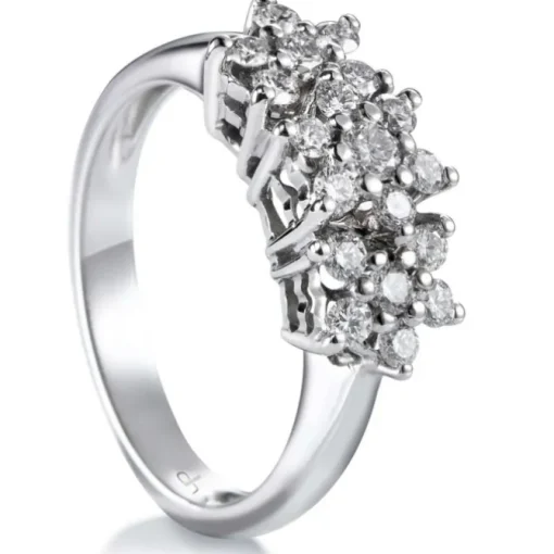 Sortija de oro blanco con 3 rosetas de diamantes en garra