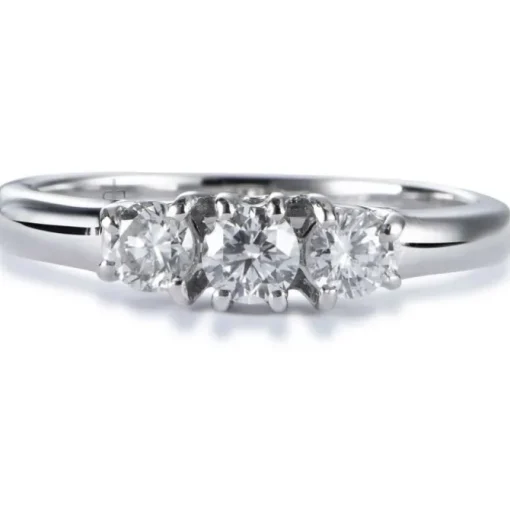 Tresillo de oro blanco con diamantes en garra