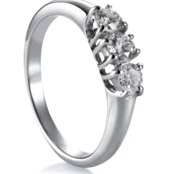 Tresillo de oro blanco con diamantes en garra